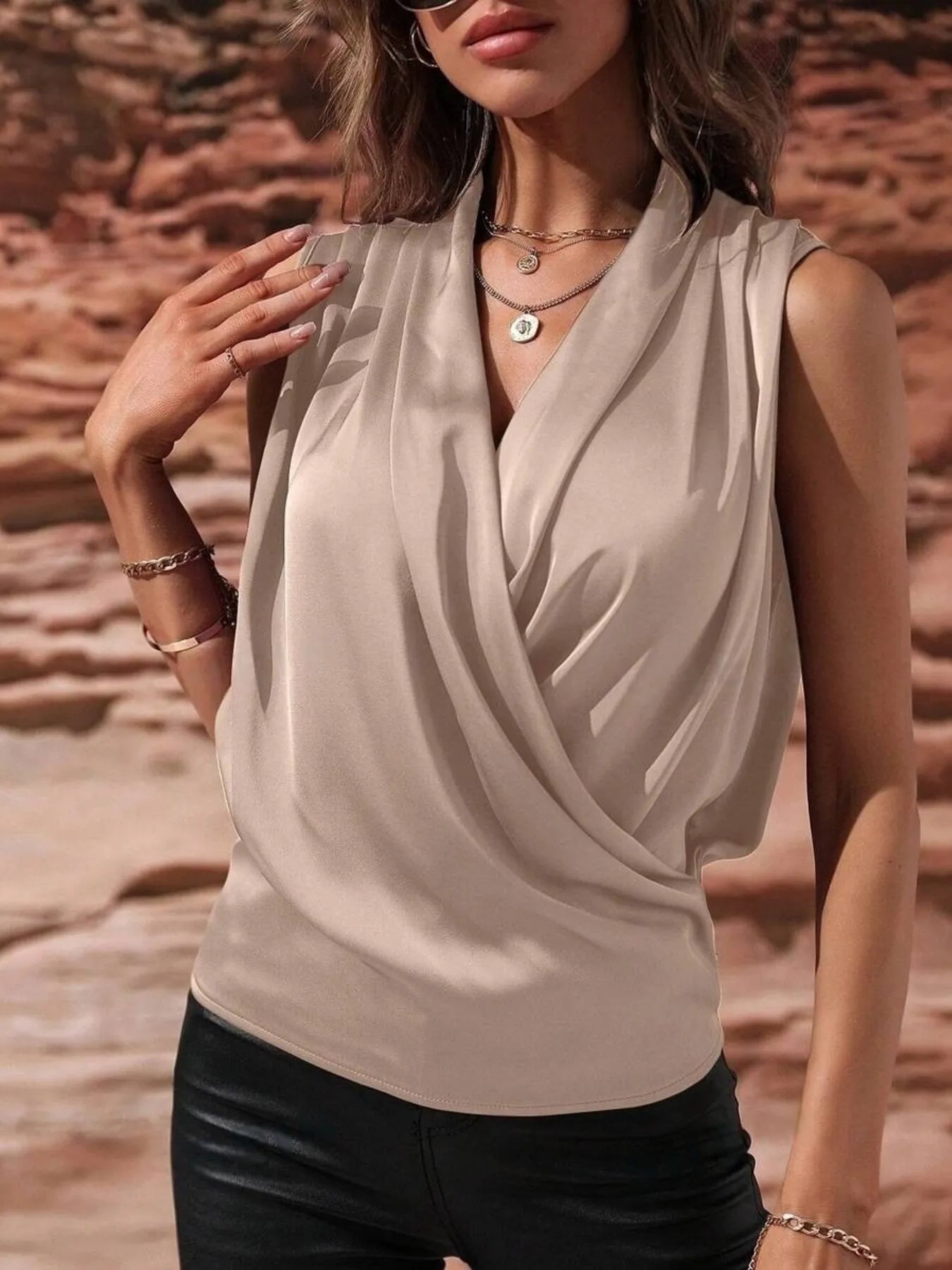 Beige Satin Draped Blouse styled with black pants and layered necklaces, ideal for office to evening transitions.
