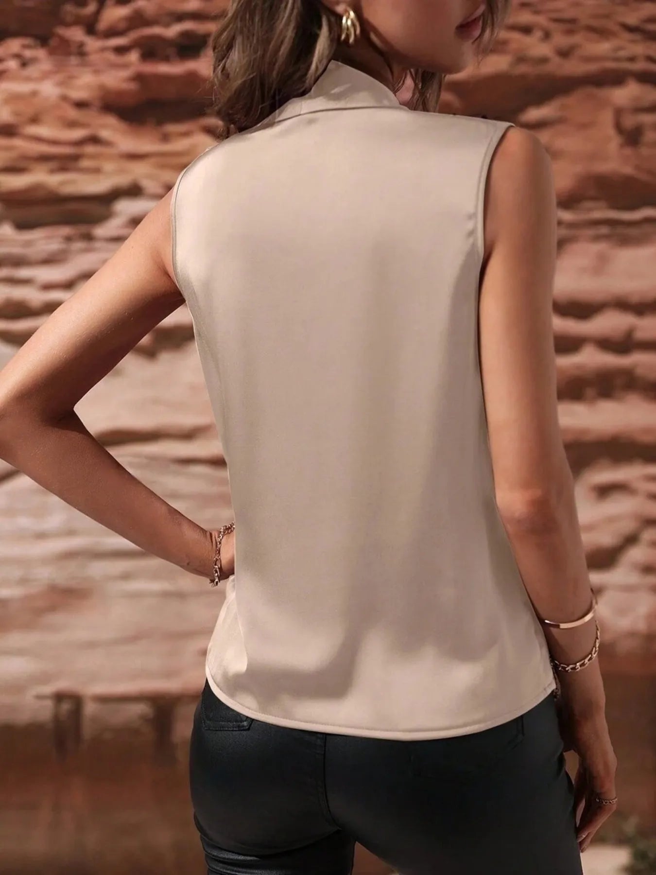 Back view of beige Satin Draped Blouse showing smooth satin texture and clean lines for a minimalist look.