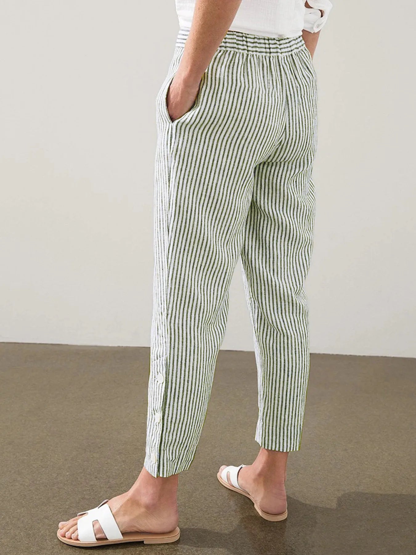 Back view of Madison Striped Button-Hem Pants in green, showing elastic waistband and tapered leg. Lightweight and breezy for summer.
