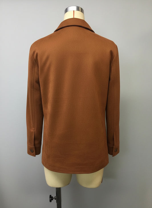 Brown jacket on a mannequin against a white background