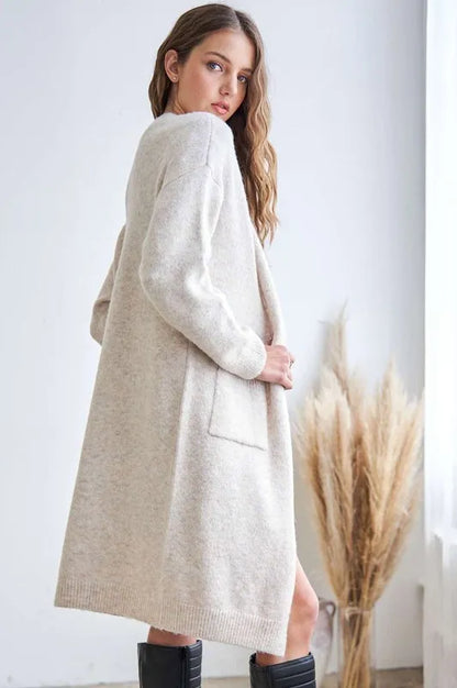 Back view of Adora open cardigan showcasing its relaxed fit and longline silhouette for effortless layering.