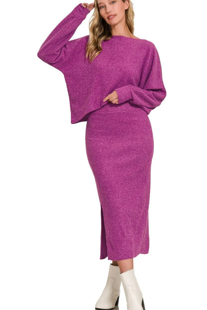 Ribbed asymmetric top & skirt set by Zenana in magenta, featuring relaxed fit top and midi skirt with front slit.