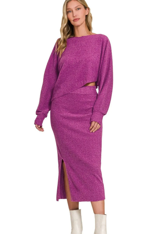 Zenana ribbed asymmetric top & skirt set in vibrant magenta with front slit, perfect for chic casual or evening wear.