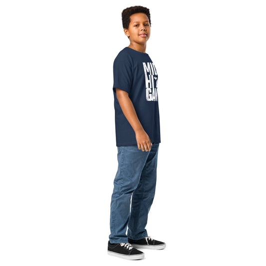 Boy wearing Boldly Michigan youth classic tee in navy blue with bold white Michigan print. Comfortable cotton top for everyday youth fashion.